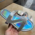 Holographic silver flat sandals featuring rhinestone encrusted Z-shaped straps for women - 36 / Laser Silver
