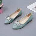 Elegant light blue pointed-toe flat shoes featuring a sparkling rhinestone buckle detail - 35 / Green