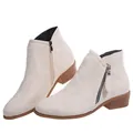 Close-up detail of beige suede ankle boots with functional side zipper and low block heel - 36 / Off White