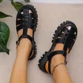 Close-up view of stylish black platform gladiator sandals with hollow-out upper design - 36 / Roman Platform Sandals (A1008) / Black