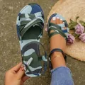Detail view of women's trendy camouflage flat sandals with elastic back strap for summer - Aqua