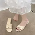 Elegant beige women's summer mules featuring a cross-strap design and mid-square block heel - 35 / Off White