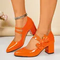 Elegant orange patent leather chunky high heels with decorative bow and double straps detail - 35 / Orange