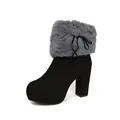 Side view detail of black chunky heel ankle boot with grey faux fur trim and bow detail - 38 / Black and Gray