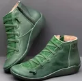 Vintage green leather women's flat ankle boots with lace-up detail and side zipper. - 36 / Green