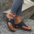 Stylish women's dark blue wedge thong sandals with intricate hollow out details - Navy Blue