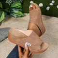 Elegant brown wedge platform slides for women featuring a stylish suede-like matte finish - Dark Brown