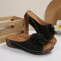 Fashionable black wedge slide sandals featuring a large 3D flower and open-toe design - 36 / Black