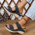 Elegant navy blue wedge sandals for women featuring floral accents and rhinestone details - 36 / Navy Blue
