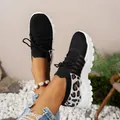 Baskets en maille noire respirante avec imprimé léopard et semelles blanches compensées - 36 / Noir