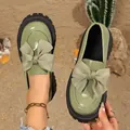 Retro olive green patent leather loafers with large bow and thick black platform soles - 36 / Green