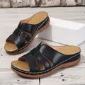Comfortable black wedge sandals for women with cutout strap design and open toe - 36 / Black