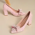 Elegant pink tweed block heel pumps featuring a pearl and rhinestone bow detail - 35 / Pink