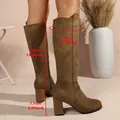 Brown suede knee-high boots with 7.7cm block heel and 34cm shaft height measurements - Camel