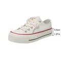Classic white low-top platform canvas sneakers with 3.5cm thick sole and red piping detail. - 35 / White