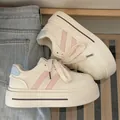 Stylish chunky cream platform sneakers for women featuring pink stripes and a light blue heel accent - 35 / Pink