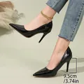 Elegant black patent leather pointed-toe stiletto pumps with a 9.5cm high heel. - 35 / Black