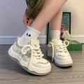 Close-up of off-white platform sneakers with green star pattern and chunky laces - 35 / Green