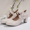 Beige patent leather Lolita Mary Jane shoes with bow detail and chunky high heels - 35 / Off White