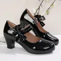 Glossy black Lolita Mary Jane shoes with chunky high heel and bow accent. - 35 / Black