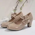 Elegant beige patent leather Lolita princess pumps with bow detail and stable block heels - 35 / Khaki