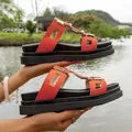 Stylish orange platform sandals with golden metal buckles for summer beach wear. - 35 / Orange