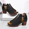 Stylish black peep toe sandals featuring chunky brown heels and adjustable buckle straps - 36 / Black