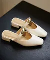 Elegant cream white square toe mules with large gold metal ornament and stable block heel - 35 / White