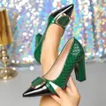 Detail of green quilted high heels with block heel and decorative gold buckle - 36 / Green