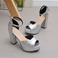 Elegant silver metallic platform sandals featuring a thick block heel and stylish peep toe design - 35 / Silver