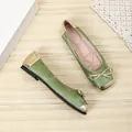 Detailed view of sage green square toe ballet flats with gold bow and metallic accents - Military Green and Gold