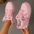 Close-up of stylish pink chunky bread sneakers with thick rope laces and platform sole. - 35 / Pink