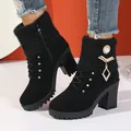 Close-up of black chunky heel boots with knitted collar and metal pendant detail - 35 / Black