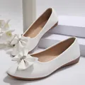 White pointed-toe flats with bowknot detail and rhinestone accent - 36 / White
