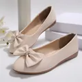 Elegant beige ballerina flats with a sparkling rhinestone bow tie accent for daily wear - Off White