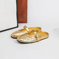 Elegant gold woven pointed-toe flat mules for women with buckle strap - 36 / Gold