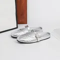 Elegant silver metallic round toe mules with woven texture and buckle strap for women - Silver