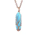 Detailed macro view of handmade copper wire-wrapped Tree of Life design on turquoise pendant - Turquoise