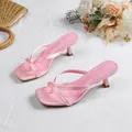 Chic pink thong sandals featuring a square toe and slim kitten heel on a white surface - 38 / Pink