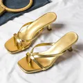 Detail view of stylish gold metallic thong kitten heel sandals with square toe for women - 38 / Gold