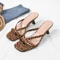Macro view of leopard print kitten heel thong sandals with a chic square toe design. - 38 / Leopard Print