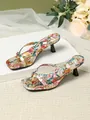 Detailed view of floral print thong kitten heel sandals with a modern square toe. - Rainbow
