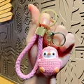 Cute pink resin penguin keychain featuring a braided leather strap for bags and cars - Resin Penguin with PU Strap / Pink