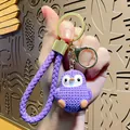 Cute purple resin cartoon penguin keychain featuring a braided strap and gold lobster clasp - Resin Penguin with PU Strap / Purple