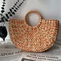 Detailansicht der halbkreisförmigen, farblich abgesetzten Strandtasche aus Papierseil - 41*24*8 / Orange