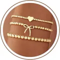 Driedelige set van gouden elastische kralenarmbanden met elegante hart- en boogbedels - Hart & Strik Armband Set (JZ-ZZ-019-6)