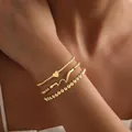 Set van goudkleurige elastische kralenarmbanden met hart- en golfvormige bedeltjes - Hart & Golf Gelaagde Armband Set (JZ-ZZ-019-10)