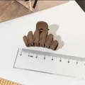 Matte milk coffee medium hair claw clip shown with a ruler for size scale reference - Fishbone Style / Light Coffee
