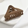 Medium-sized matte coffee brown hair claw clip with a classic hollow triangle design - A-Triangle / Light Coffee