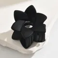 Matte black flower hair claw clip for elegant half-tie hairstyles in a minimalist matte finish - Hollow Six-Petal Flower / Black